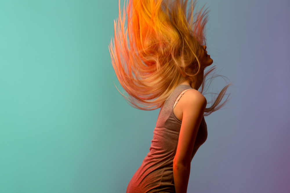 profile pretty blonde young woman shaking her hair | JanLondon